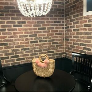 Chic Natural Straw Wall Basket with Pink Accents